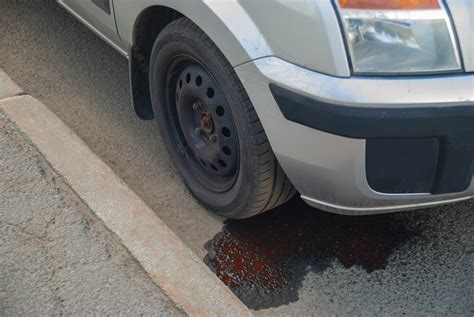 car is leaking red fluid|Why My Car Leaking Fluid Front Passenger Side